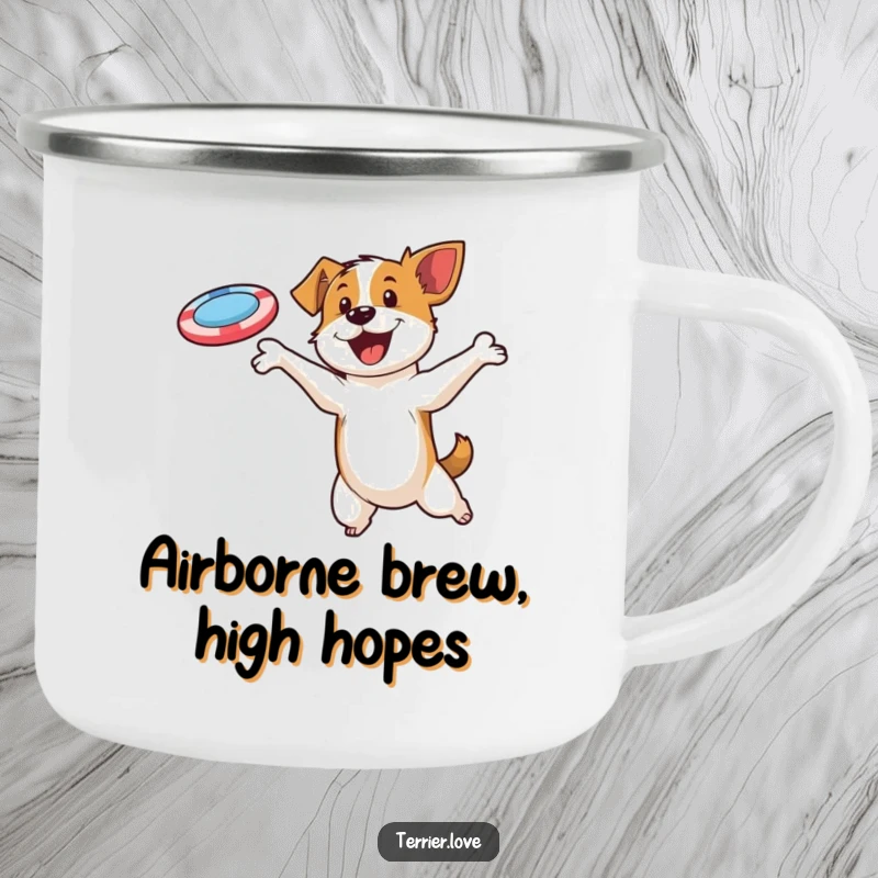 Funny camping mug showing a tenacious terrier leaping high to snag a flying disc, ideal for outdoor enthusiasts.