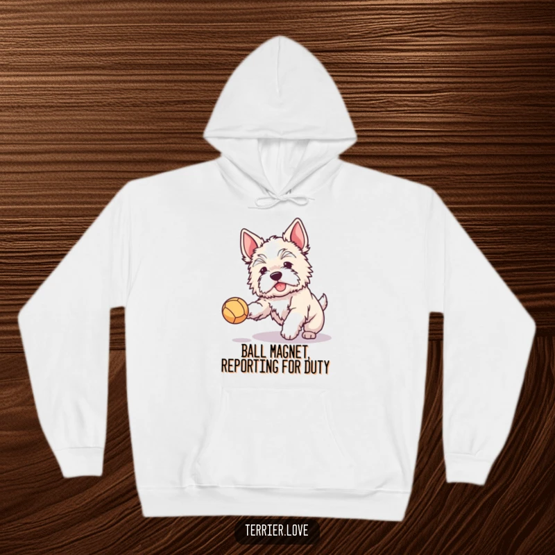 Funny and cozy hoodie featuring a fluffy terrier with perked ears joyfully catching a ball, embodying playful energy and happiness.