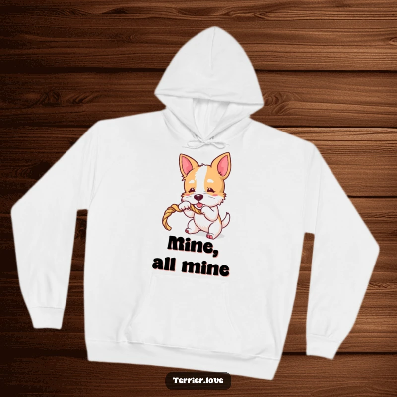 Funny Terrier Hoodie: Comfortable sweatshirt featuring a playful dog character enthusiastically tugging on a rope toy.