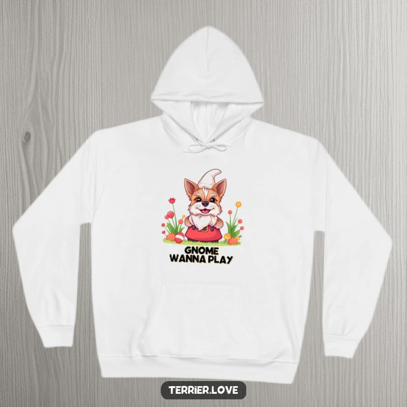 Funny terrier hoodie with a dog peeking coyly from behind a garden gnome with a big grin, radiating warmth and humor.
