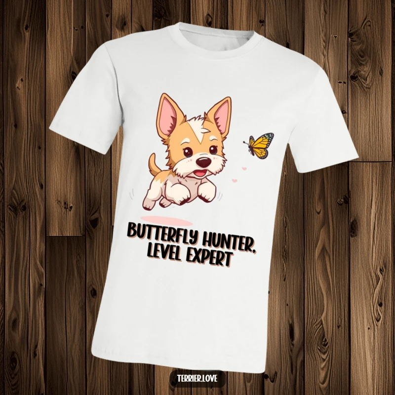 Funny terrier t-shirt depicting a playful dog with alert ears, enthusiastically chasing a swift butterfly.