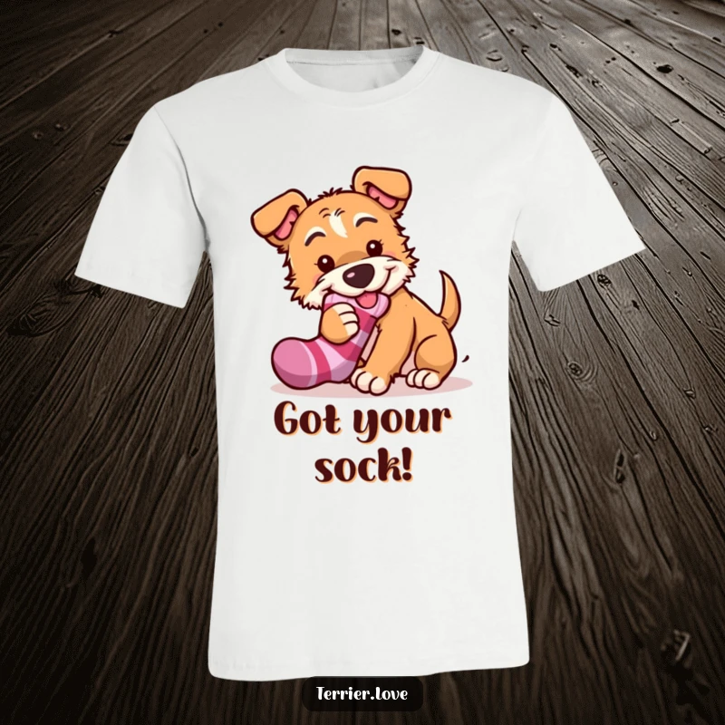 Funny playful terrier t-shirt featuring a mischievous dog trying to steal a sock, perfect for pranksters and dog lovers alike.